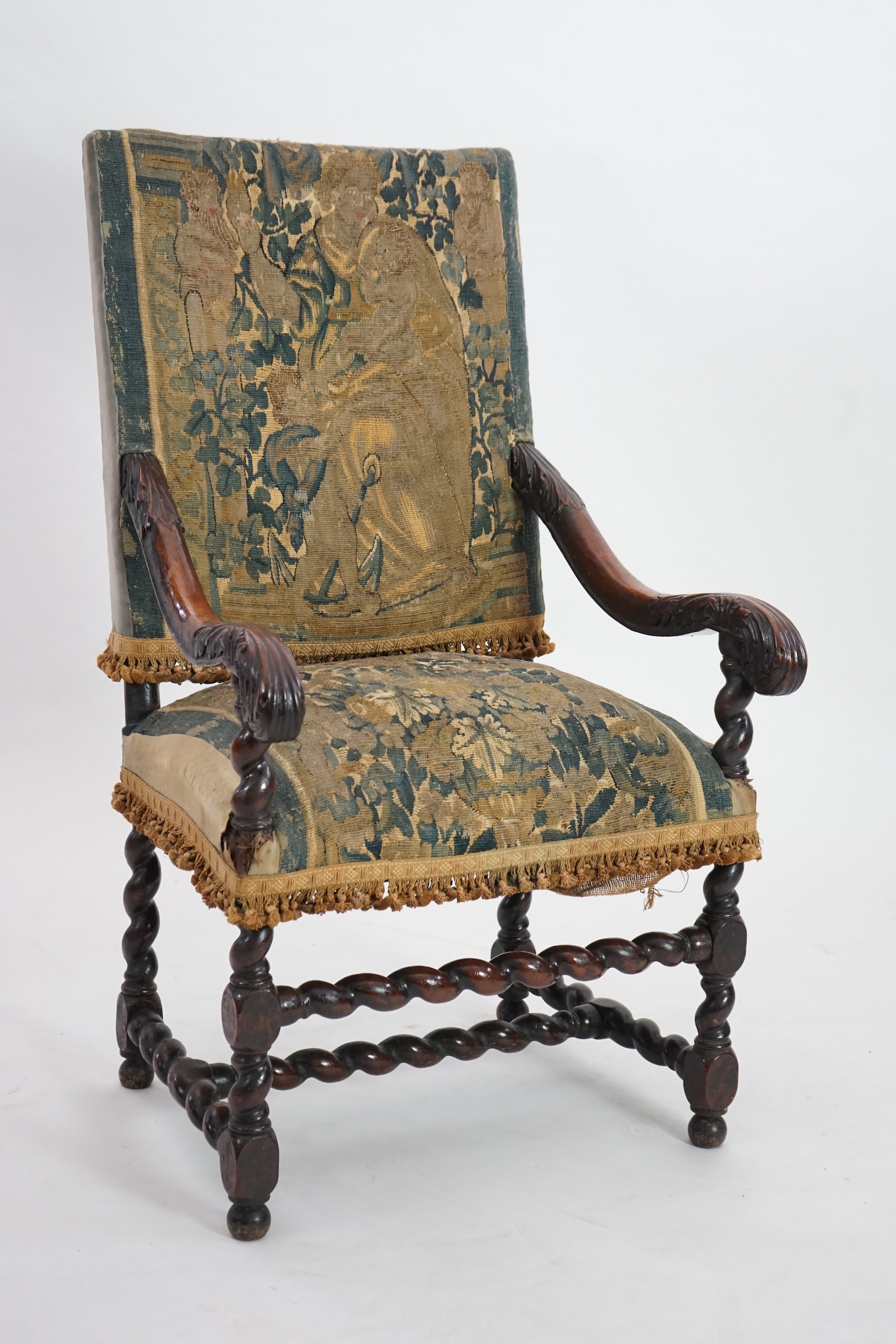 A 17th century French walnut fauteuil